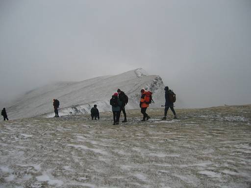 12_15-2.jpg - Approaching the summit. Cold, windy, hailing and icy. But at least we have sporadic views.